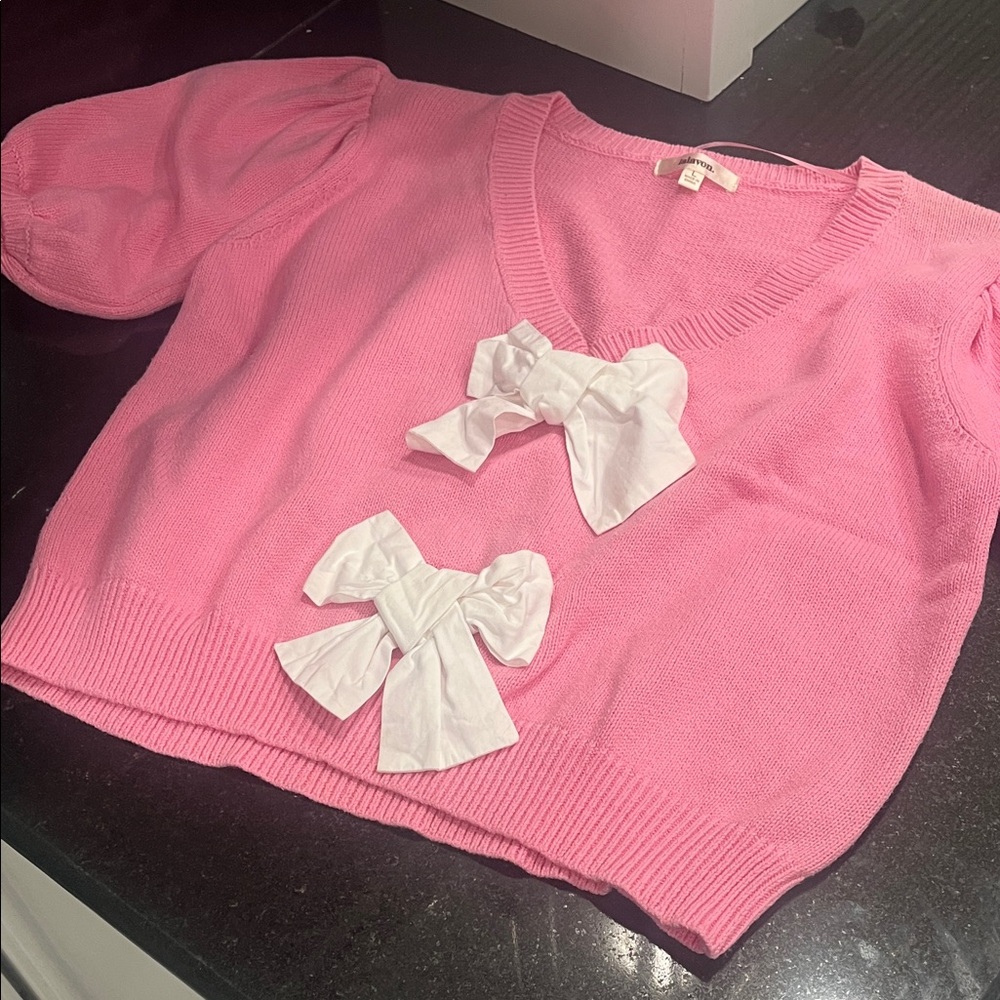 Pink V-Neck Sweater with White Bow Accents
